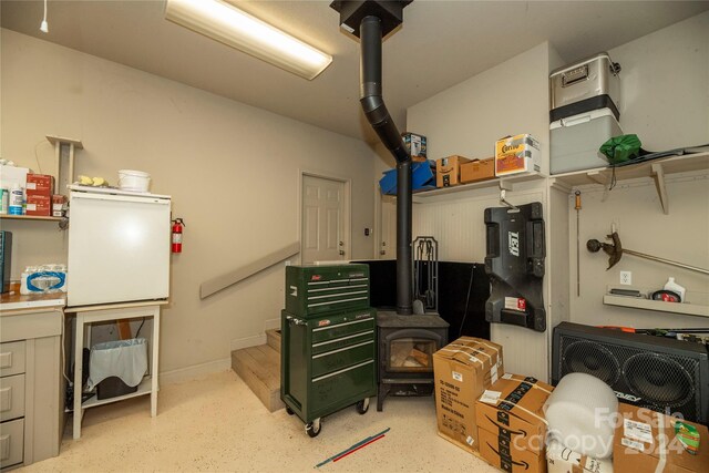 garage with a wood stove