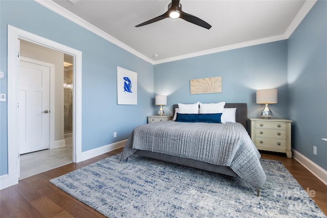 bedroom featuring dark wood-type flooring, ceiling fan, and ornamental molding