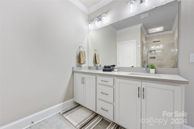 bathroom with tiled shower, crown molding, tile patterned floors, and double sink vanity