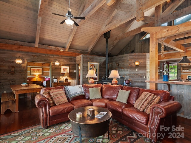 living room featuring wood ceiling, beam ceiling, high vaulted ceiling, wood walls, and hardwood / wood-style flooring