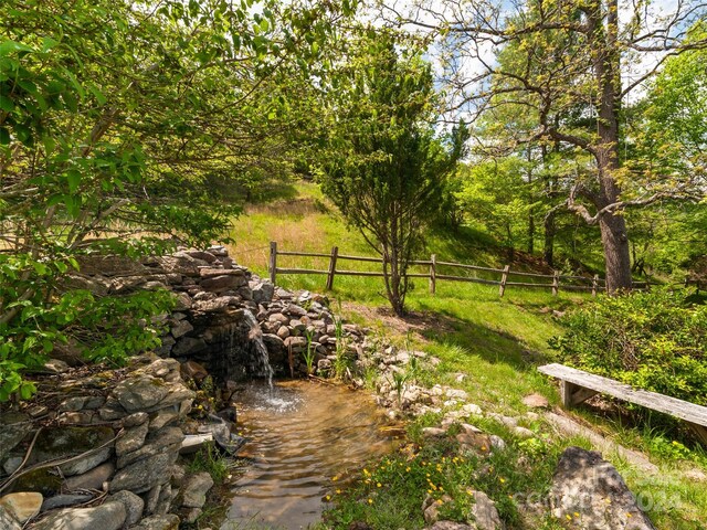 view of yard featuring a water view