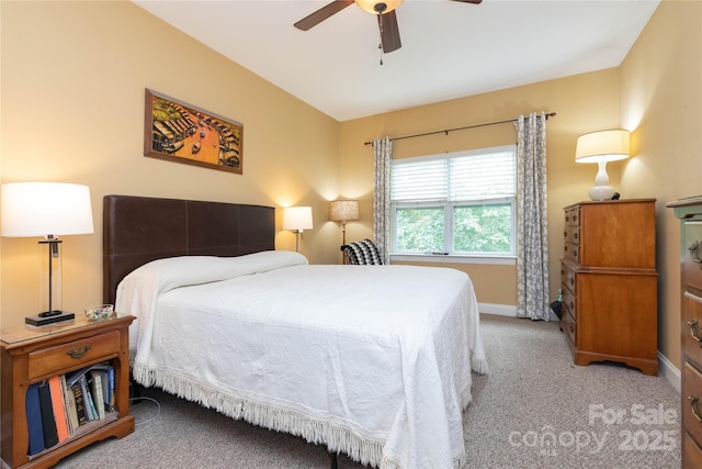 bedroom with light colored carpet and ceiling fan