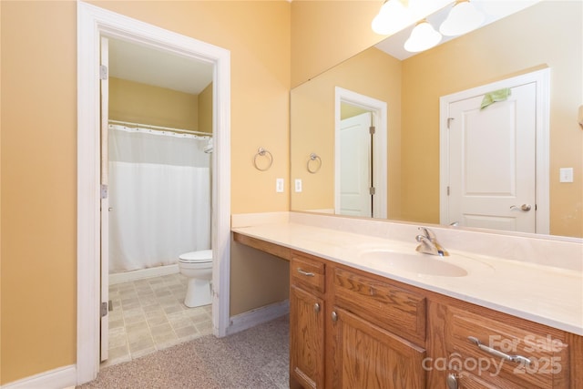 bathroom featuring a shower with curtain, vanity, and toilet