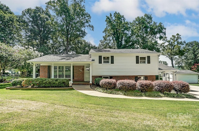 split level home featuring a front lawn