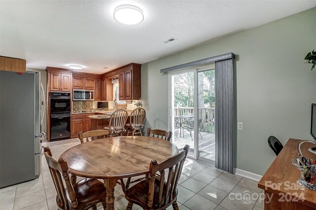 view of tiled dining room