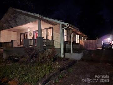 view of property exterior at twilight