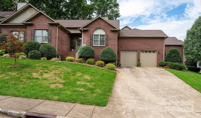 view of front facade featuring a garage and a front lawn