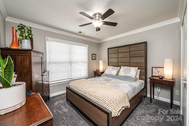 carpeted bedroom with ornamental molding and a textured ceiling