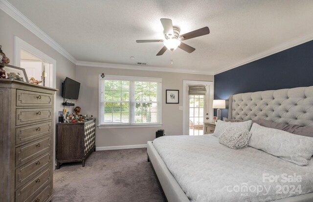 bedroom with ornamental molding, ceiling fan, and dark colored carpet