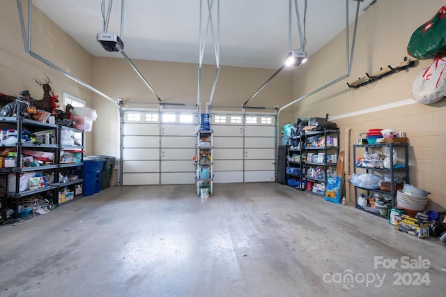 garage featuring a garage door opener