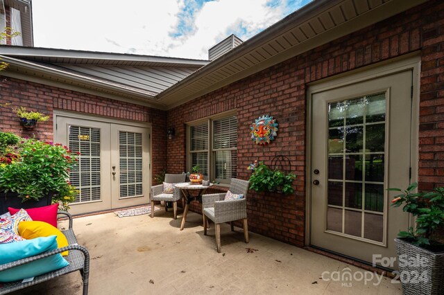 view of patio / terrace featuring french doors