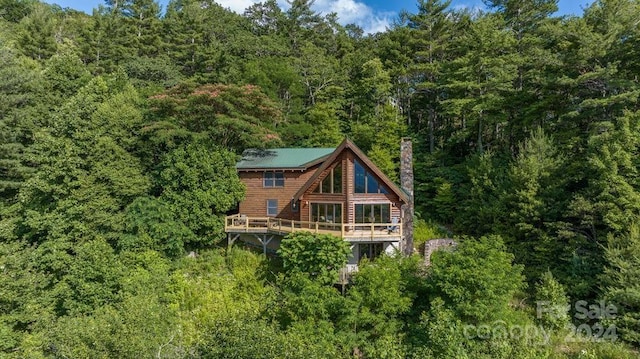 rear view of house with a deck