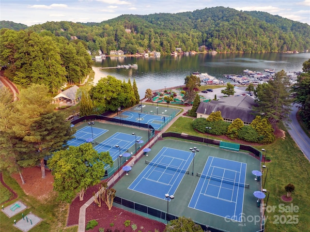 drone / aerial view with a water view