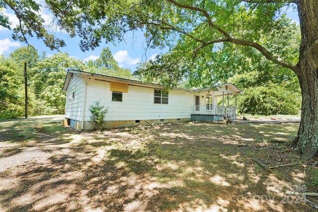 exterior space featuring covered porch