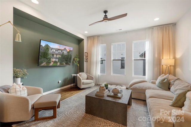 living room featuring ceiling fan