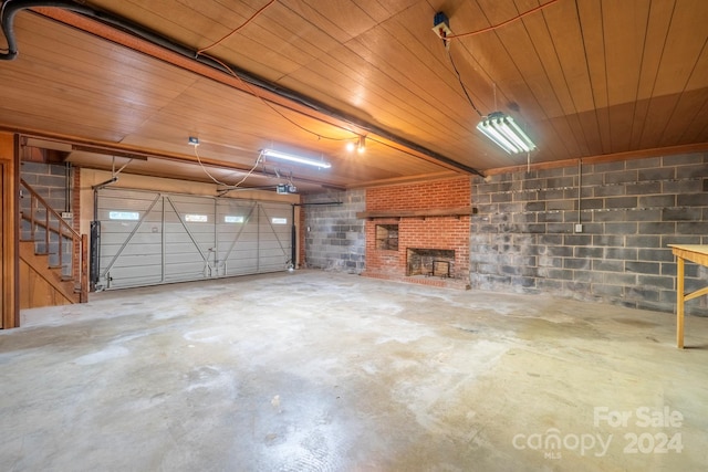 garage featuring wooden ceiling