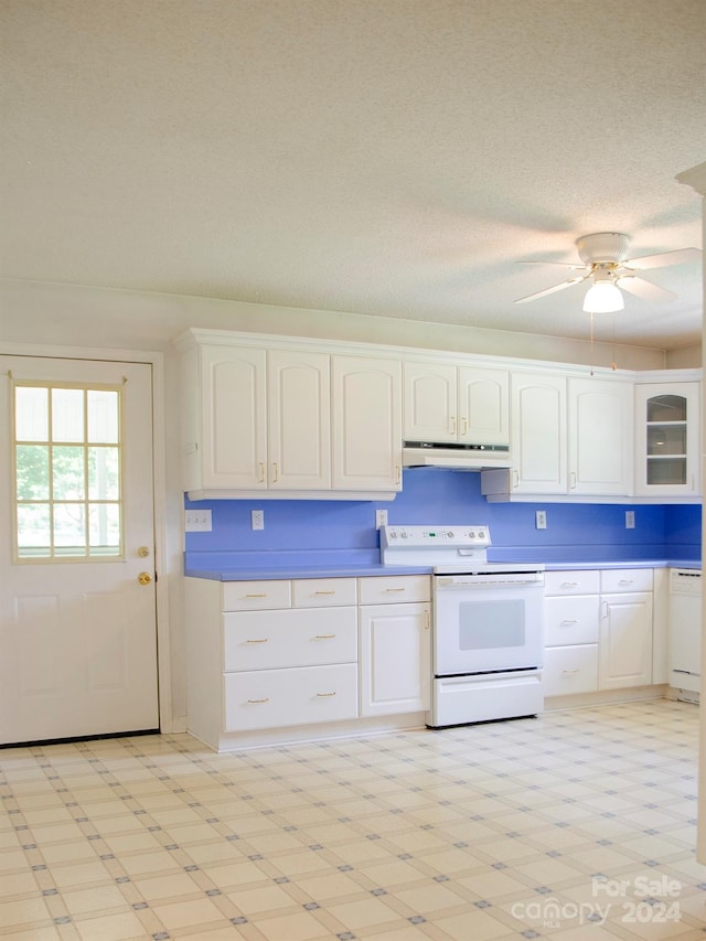 kitchen with ceiling fan, white cabinetry, white appliances, and light tile patterned floors