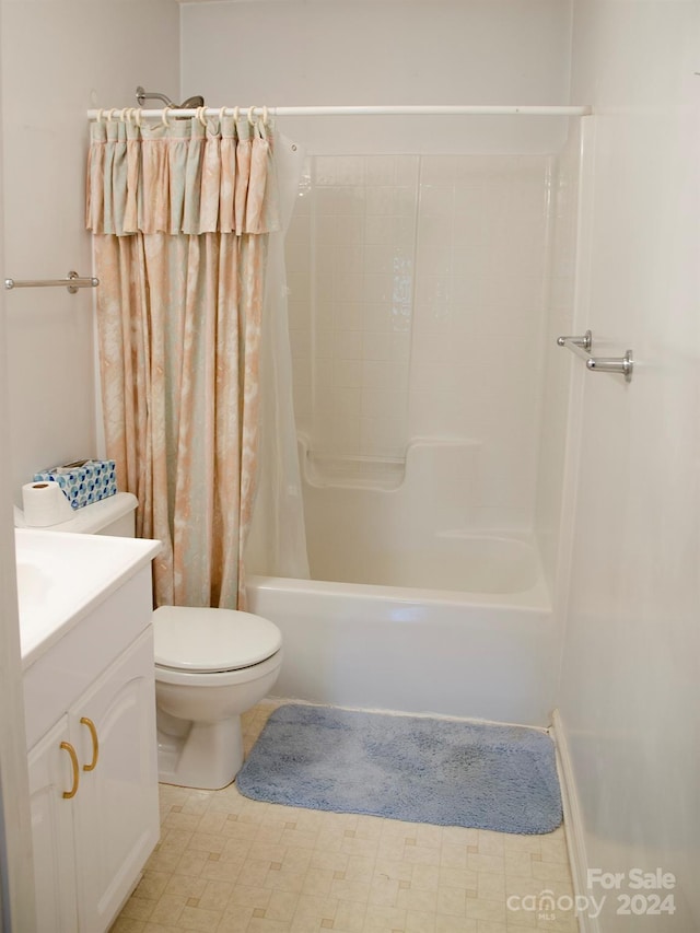 full bathroom featuring shower / bathtub combination with curtain, toilet, tile patterned floors, and vanity