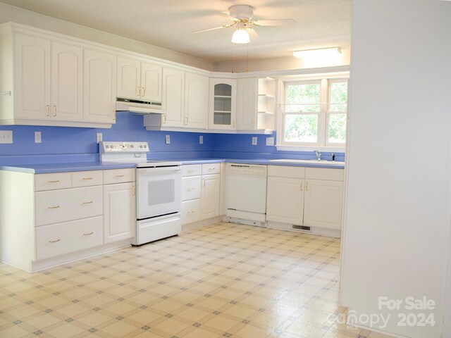 kitchen featuring white cabinets, white appliances, sink, and ceiling fan