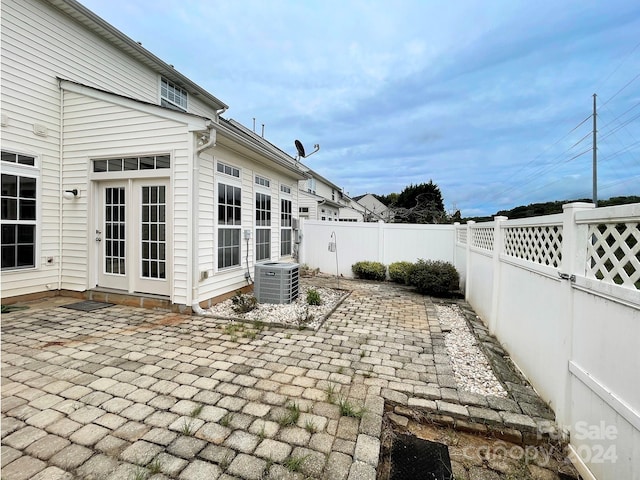 view of patio / terrace with central AC unit