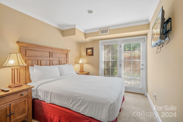 bedroom with visible vents, light colored carpet, access to exterior, and crown molding