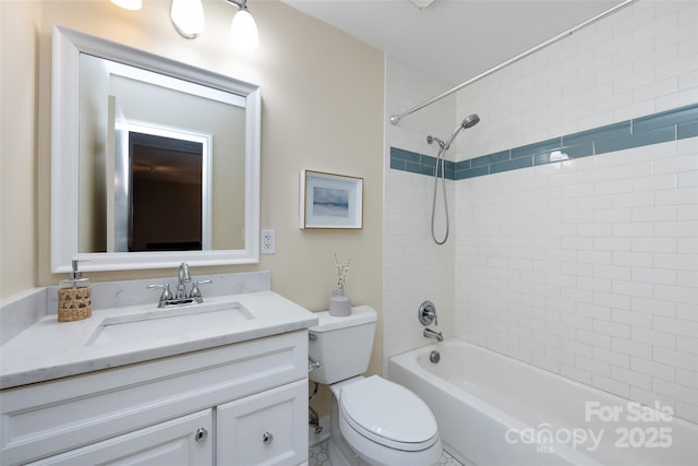 bathroom featuring shower / bath combination, vanity, and toilet