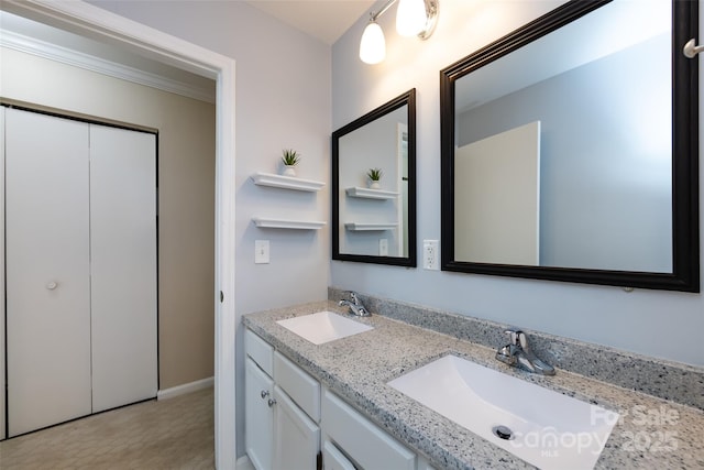 full bath featuring double vanity and a sink