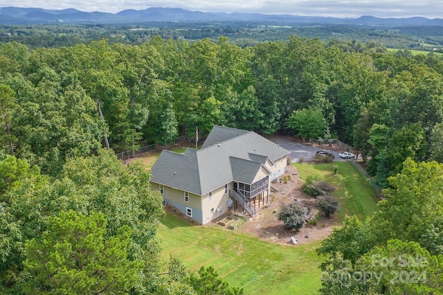 drone / aerial view featuring a mountain view