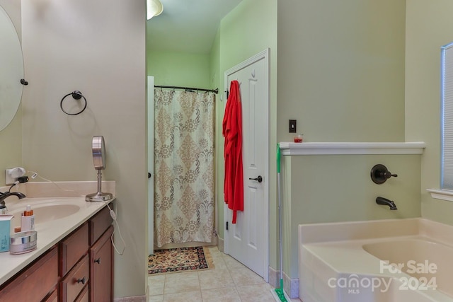 bathroom featuring tile patterned floors and vanity