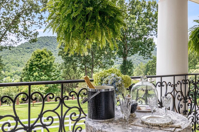 balcony featuring a mountain view