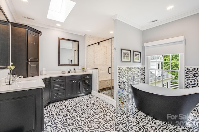 56 Fair Oaks Est, Fletcher, NC 28732 - bathroom featuring crown molding, visible vents, and a skylight