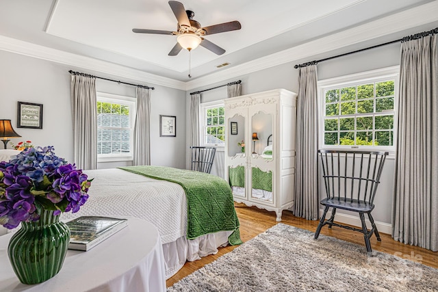 56 Fair Oaks Est, Fletcher, NC 28732 - bedroom with light wood-style flooring, visible vents, access to exterior, and a tray ceiling
