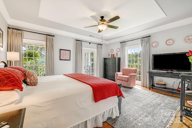 56 Fair Oaks Est, Fletcher, NC 28732 - bedroom featuring wood finished floors, ornamental molding, and a raised ceiling