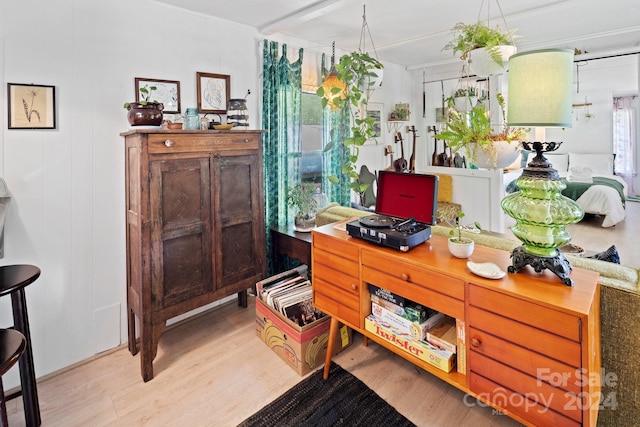 office area with light hardwood / wood-style floors