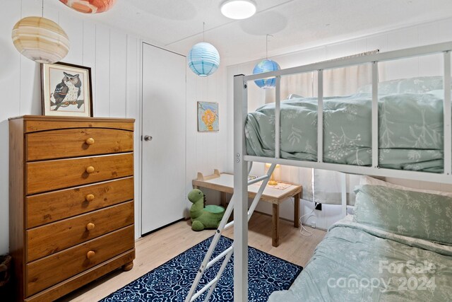 bedroom featuring light wood-type flooring