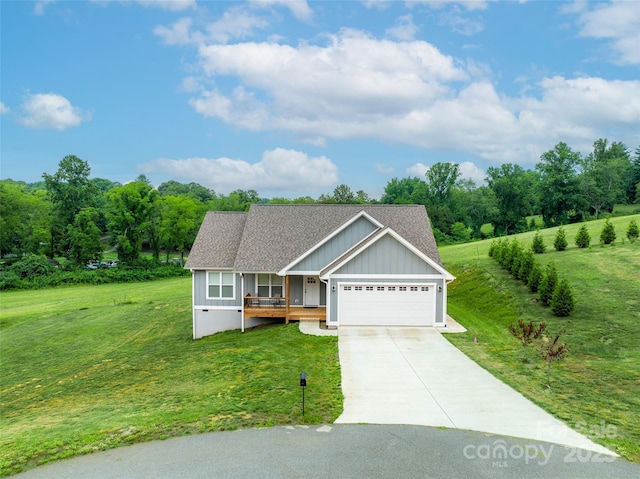 view of front facade featuring a garage and a front lawn