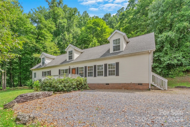 view of new england style home