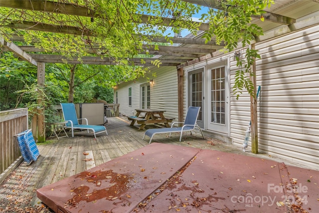 wooden deck featuring a pergola