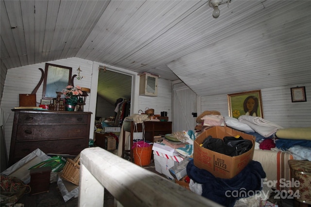 bedroom featuring lofted ceiling and wood ceiling