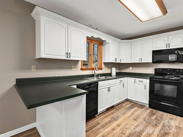 kitchen featuring kitchen peninsula, white cabinets, light hardwood / wood-style floors, black appliances, and sink