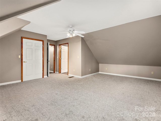 bonus room with carpet, ceiling fan, and vaulted ceiling