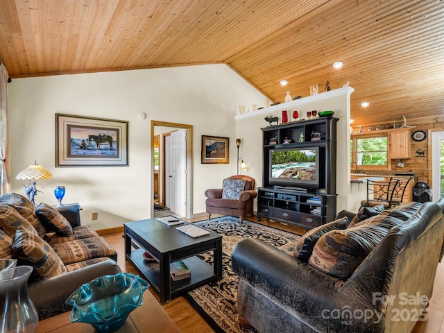 living room featuring light hardwood / wood-style flooring, wood ceiling, and lofted ceiling