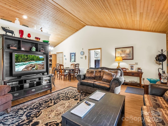 living room with crown molding, light hardwood / wood-style flooring, wood ceiling, and vaulted ceiling