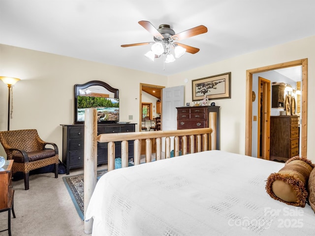 bedroom featuring ceiling fan and light colored carpet