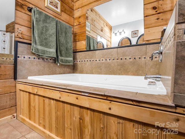 bathroom with tile patterned flooring