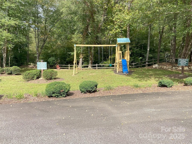 view of play area featuring a lawn