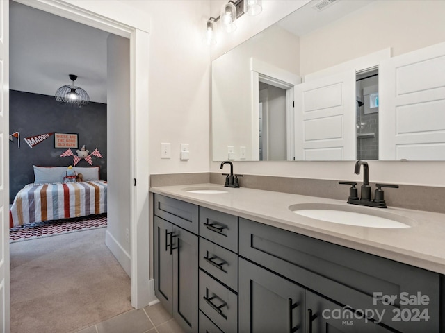 bathroom featuring vanity and tile patterned floors