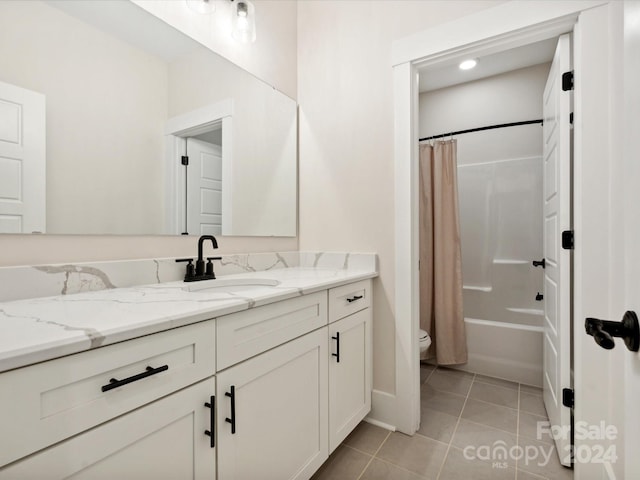 full bathroom with tile patterned flooring, vanity, shower / tub combo with curtain, and toilet