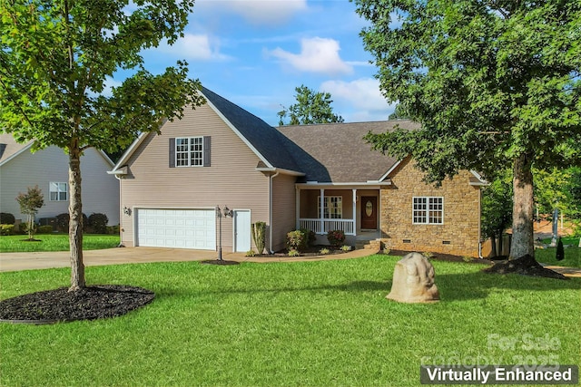 view of front of house featuring covered porch, a garage, and a front lawn