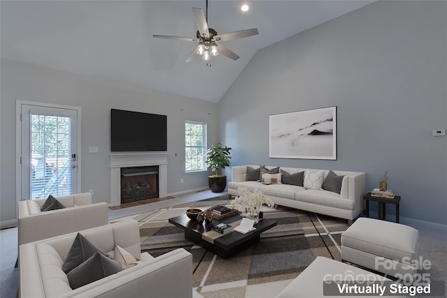 living room featuring carpet floors, vaulted ceiling, and ceiling fan